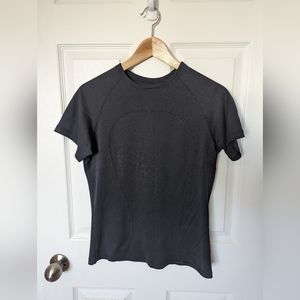 Lululemon | Black T-Shirt with Reflective Design, Size 8